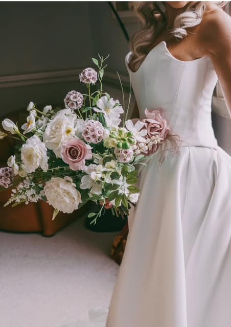 Model holding custom real touch wedding bouquet