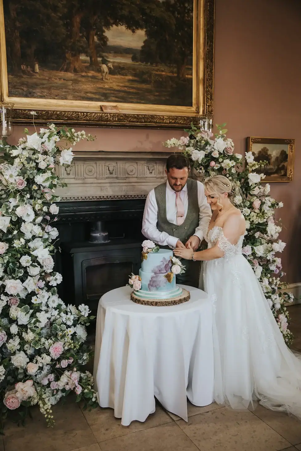 Arch Rental with cream and blush flowers at Staunton Harold